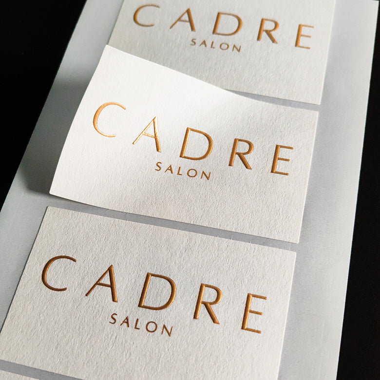 Custom embossed stickers & labels with print & foil