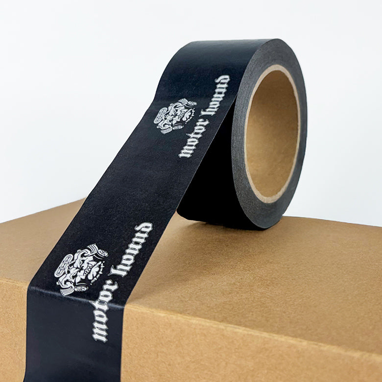 Black tape with 'motor hound' branding on a cardboard box