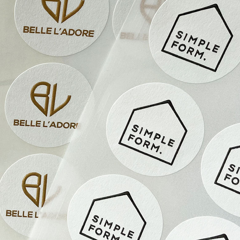 Custom embossed stickers & labels with print & foil