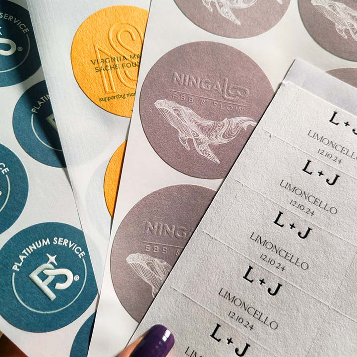 Custom embossed stickers & labels with print & foil