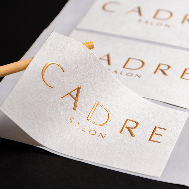Custom embossed stickers & labels with print & foil
