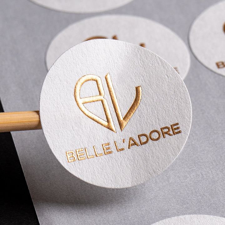 Custom embossed stickers & labels with print & foil