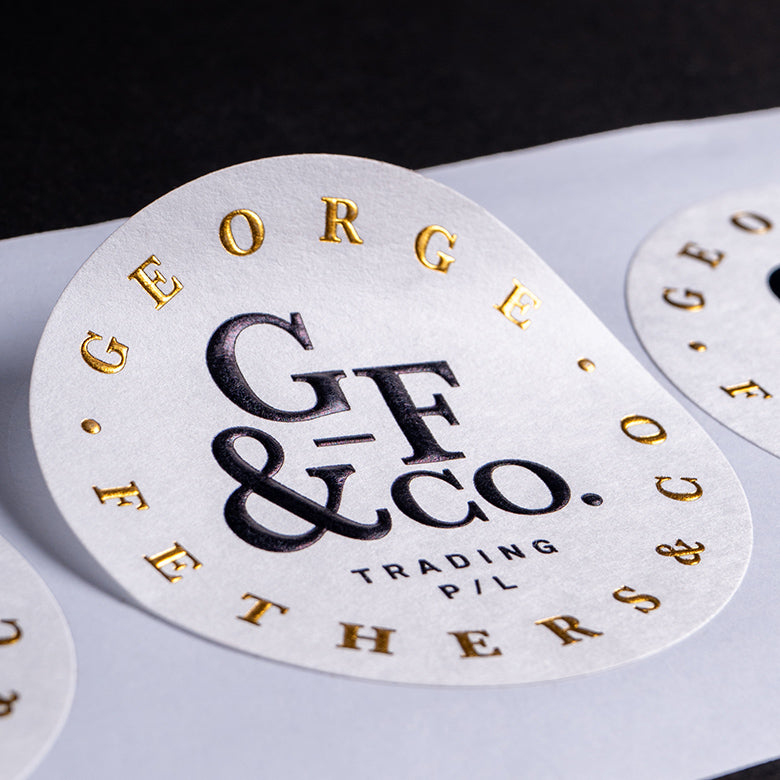 Custom embossed stickers & labels with print & foil