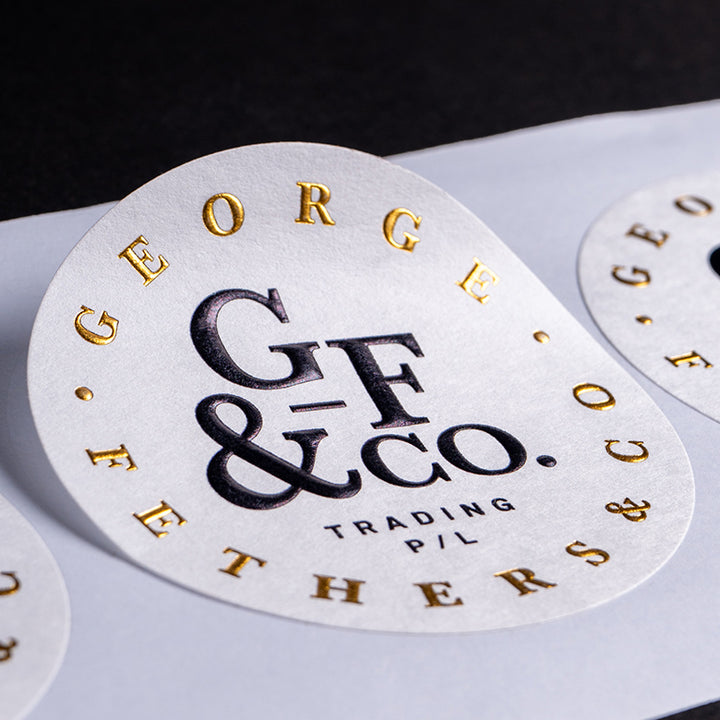 Custom embossed stickers & labels with print & foil