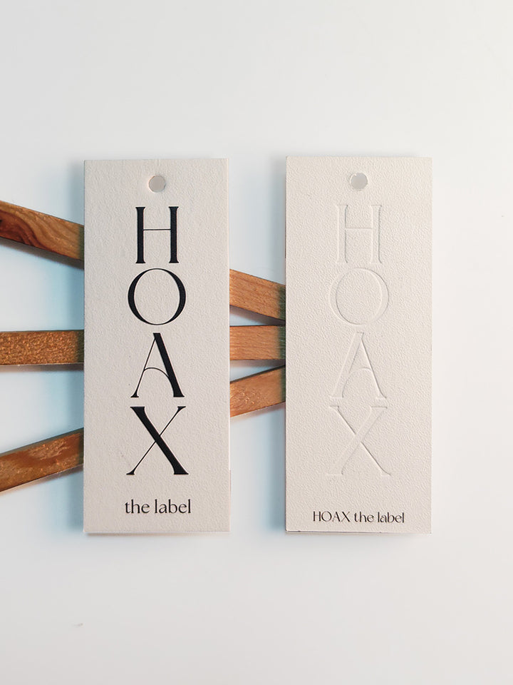 ECO-FRIENDLY CUSTOM EMBOSSED HANG TAGS WITH YOU LOGO.